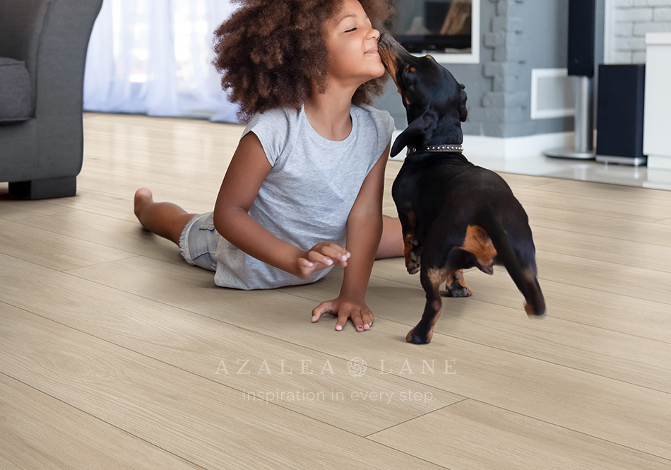 Azalea Lane Waterproof Luxury Vinyl Denali girl on floor with puppy