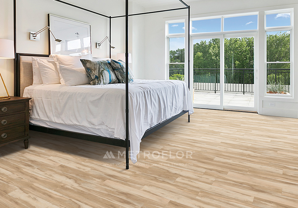 Inception 120 color Church Street Maple waterproof flooring in primary bedroom